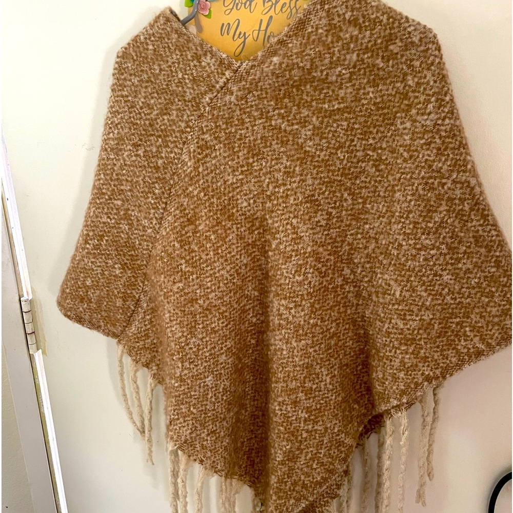 New poncho cute , soft and warm for fall and winter . Size s/m